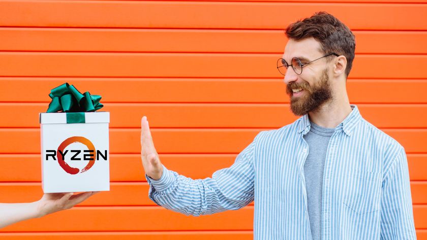 A stock photo of a man saying &#039;no thank you&#039; to a gift box bearing the AMD Ryzen logo.