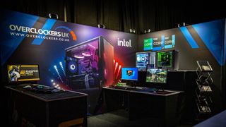 The Overclockers setup for the EPIC.LAN 2023 gaming event including a number of gaming PCs and Intel brand signs