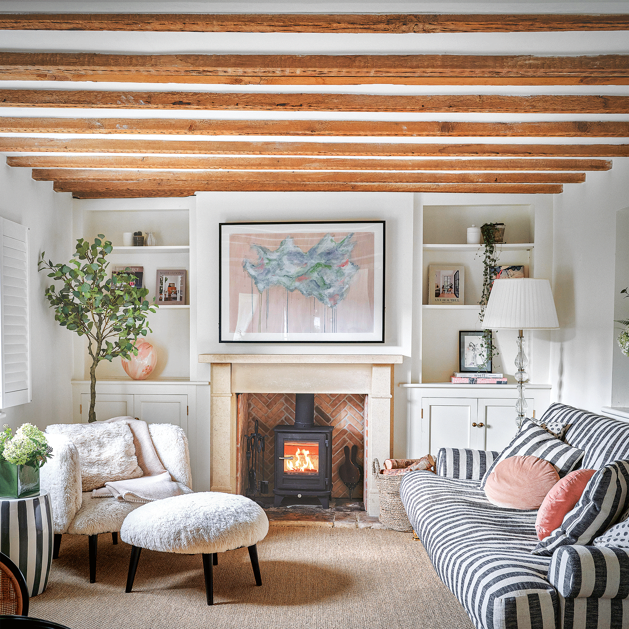 Wooden beam ceiling in white period living room