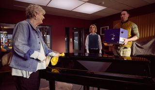 Professor Harriet Maven cleaning her piano with Jack and Nikki in Silent Witness season 28