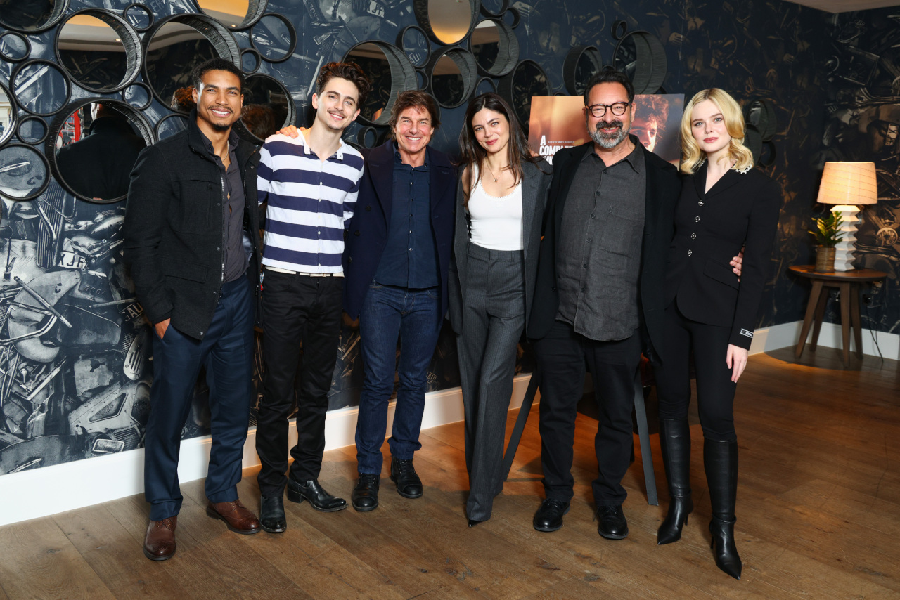 LONDON, ENGLAND - DECEMBER 17: (L-R) Greg Tarzan Davis, Timothée Chalamet, Tom Cruise, Monica Barbaro, James Mangold and Elle Fanning attend the UK Awards Screening of Searchlight Pictures' 