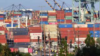 Containers stacked high are seen at the Port of Los Angeles on September 28, 2021 in Los Angeles, California