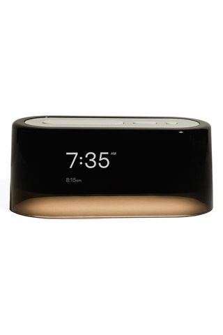 black alarm clock with gold bottom
