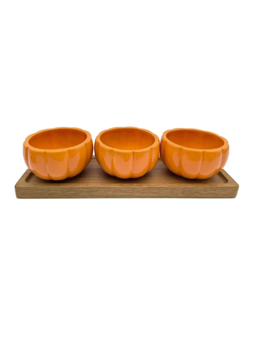 Pumpkin-Shaped Bowls on Wooden Board