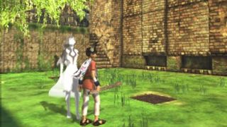 Ico standing in a green field during the PS2 game Ico.