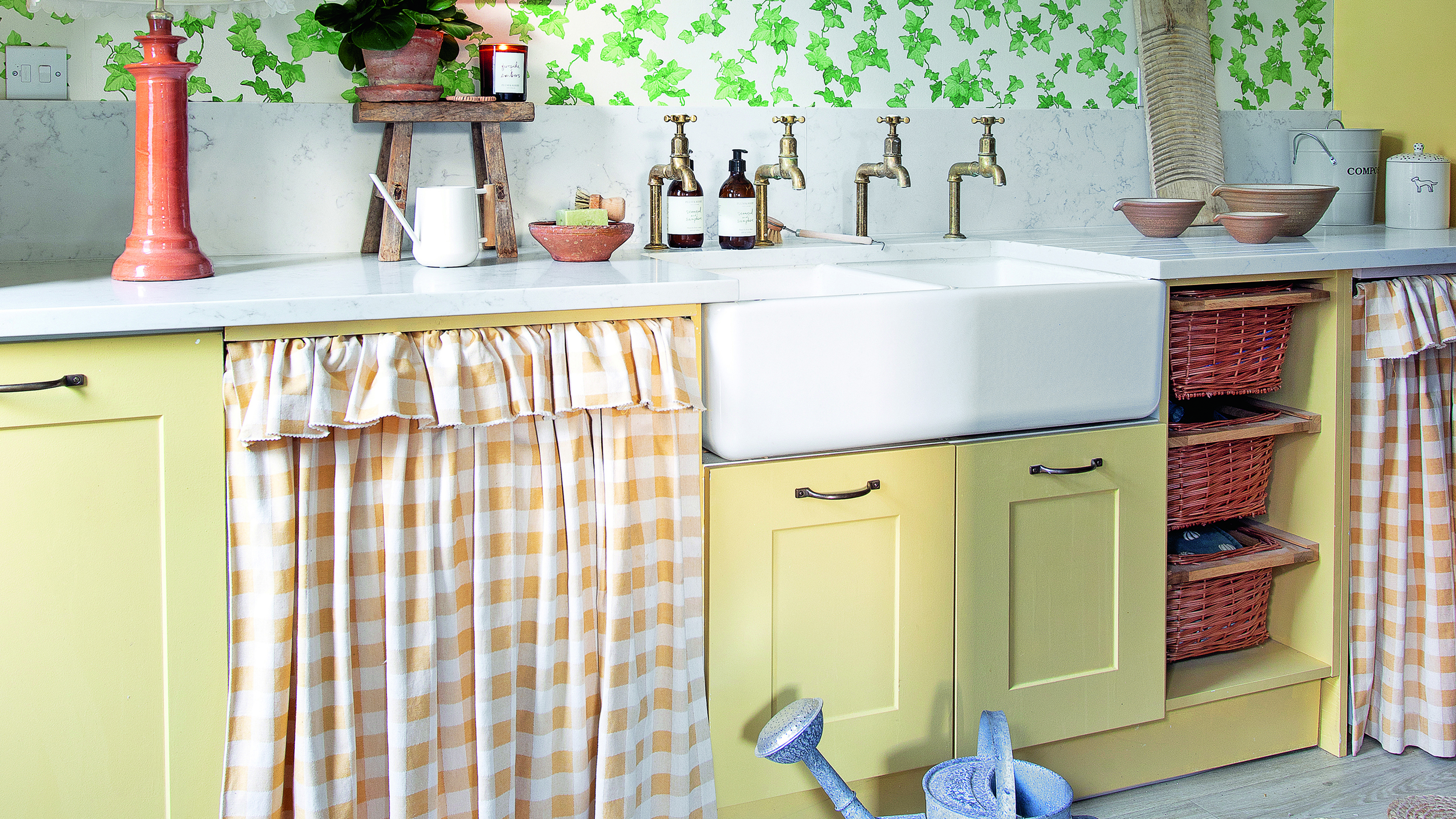 Cupboard curtains in yellow kitchen