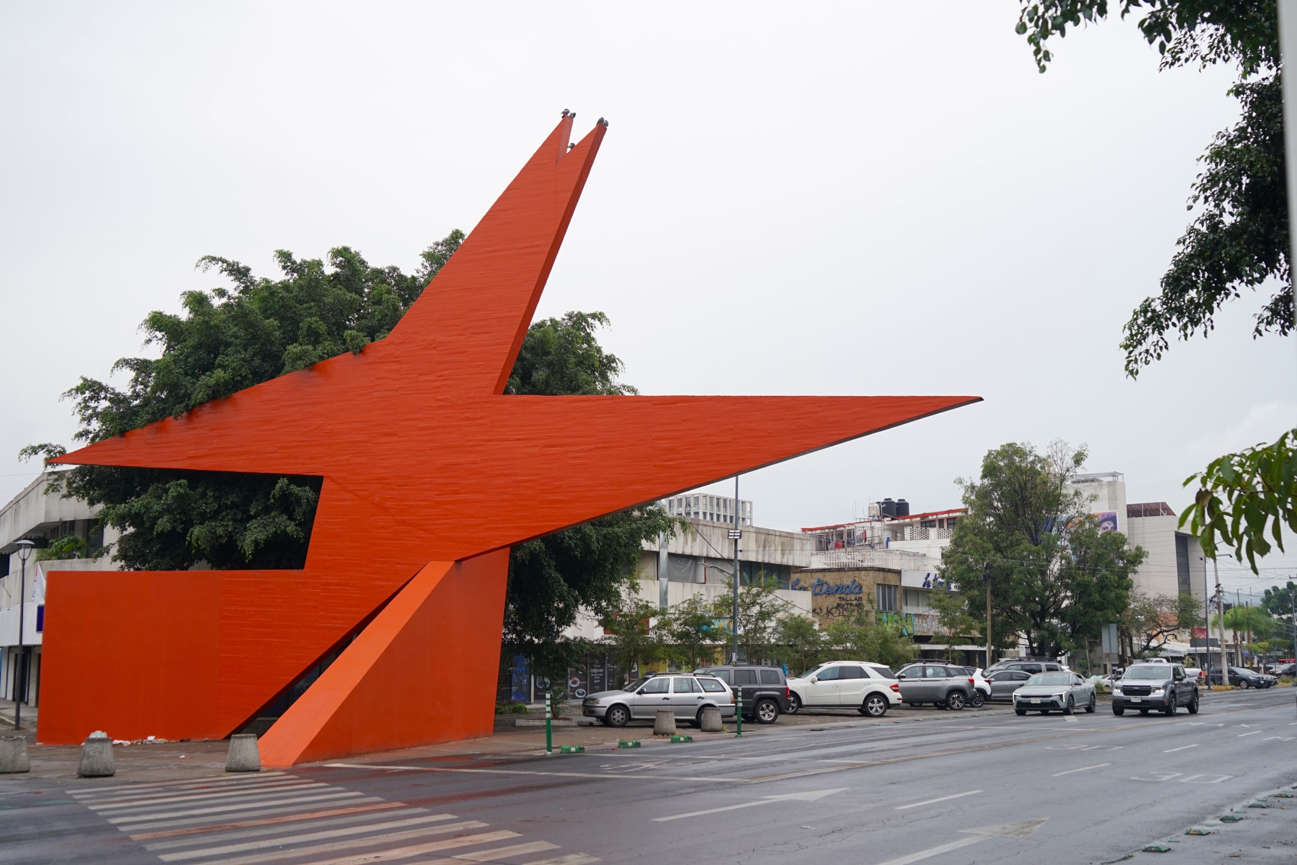 large scale, red artwork by Mathias Goeritz