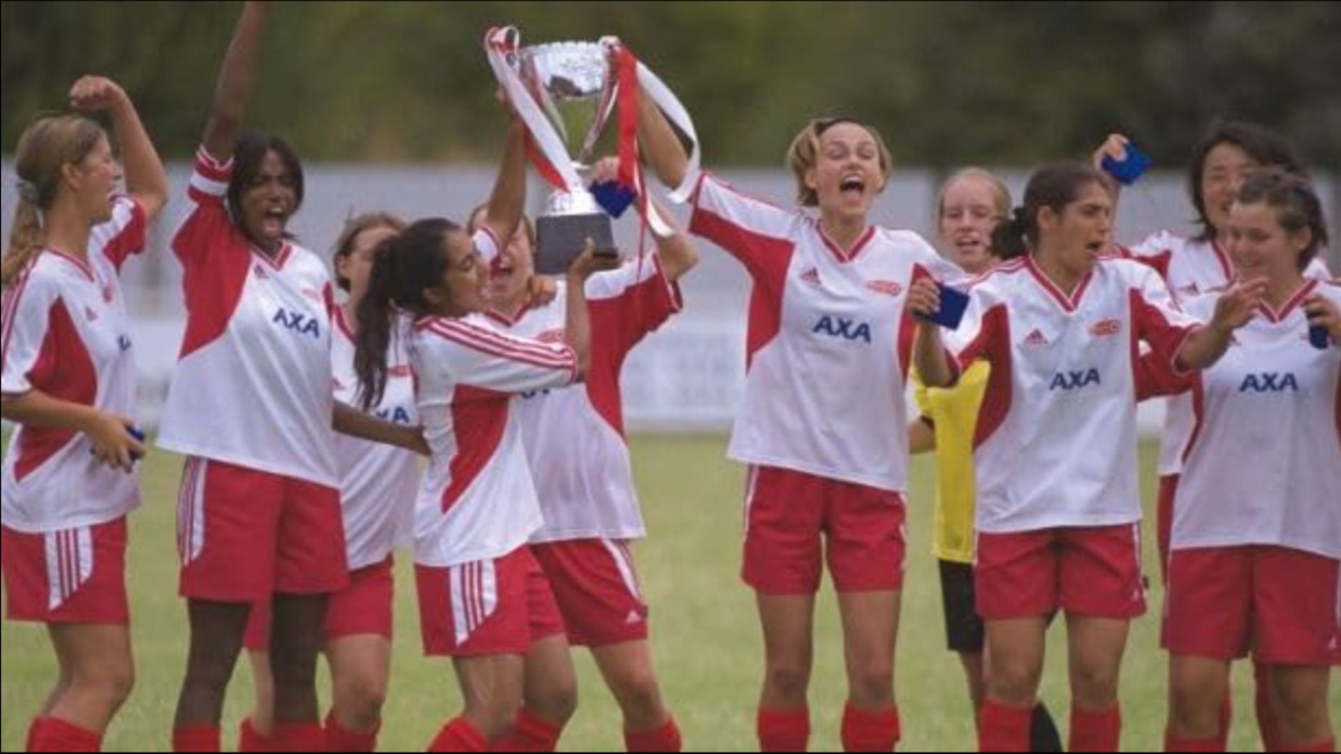 an image of the football team in bend it like beckham celebraitng winning a match
