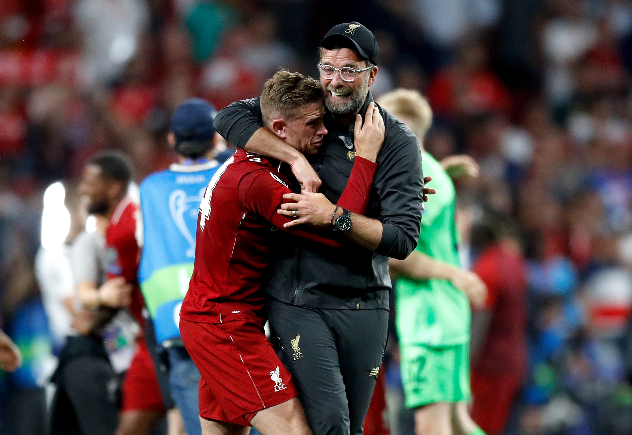 Jurgen Klopp celebrates victory with Jordan Henderson
