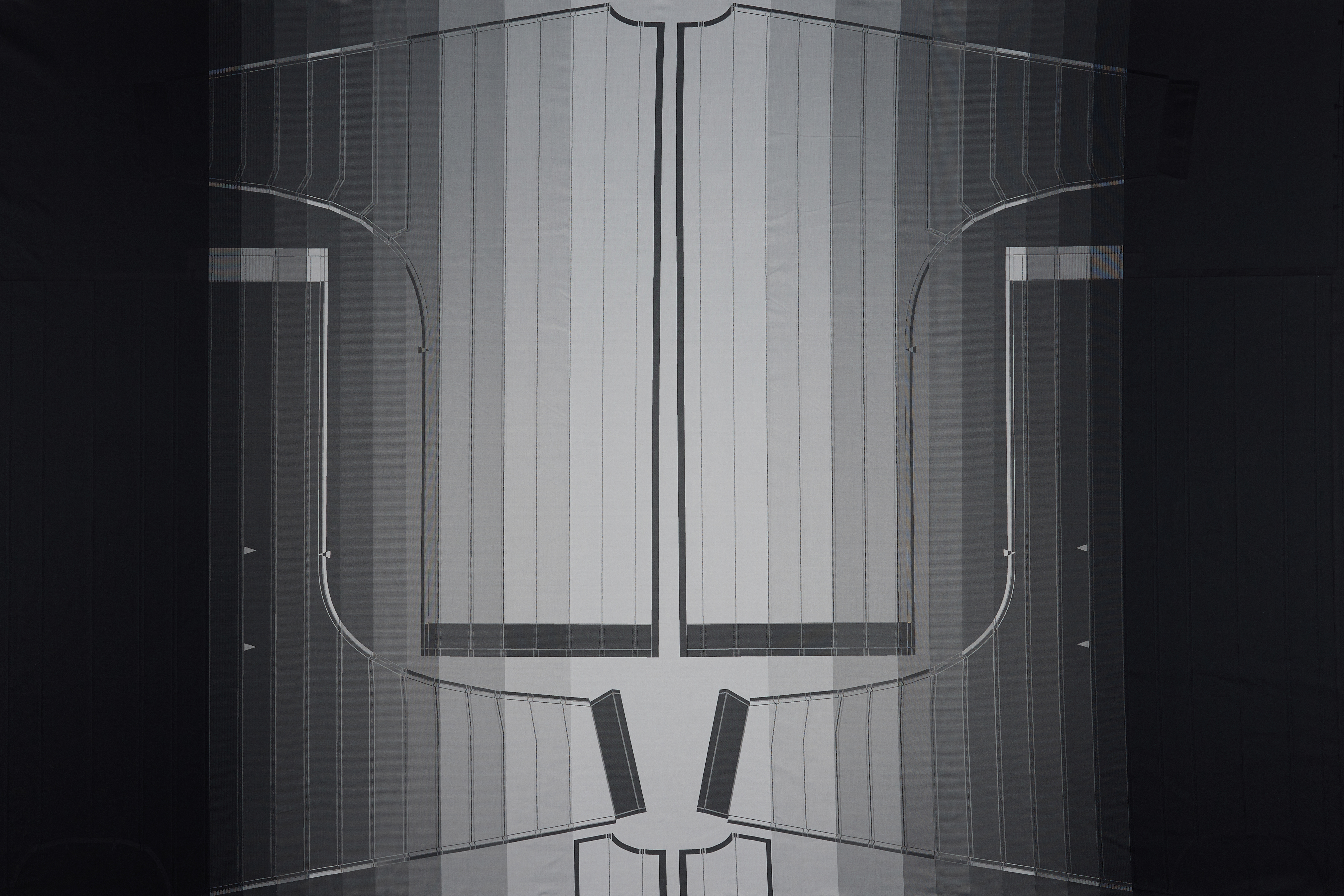 black image of silver sculpture