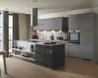 A modern kitchen design with matt slate grey cabinetry