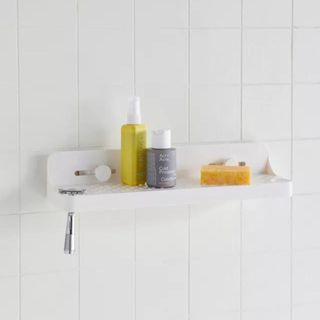 Sticky shower shelf Bathroom storage and organization from Urban Outfitters