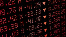 stock market ticker board in red
