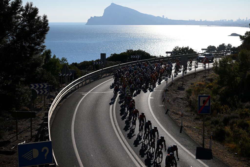 ALTO DE PINOS SPAIN FEBRUARY 02 Silhouette of the peloton competing during the 74th Volta a la Comunitat Valenciana 2023 Stage 2 a 1782km stage from Novelda to Alto de Pinos 621m VCV2023 VoltaValenciana on February 02 2023 in Alto de Pinos Spain Photo by Dario BelingheriGetty Images