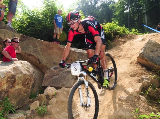 Stephen Ettinger (BMC Mountain Bike Racing Team) racing in third position on lap one