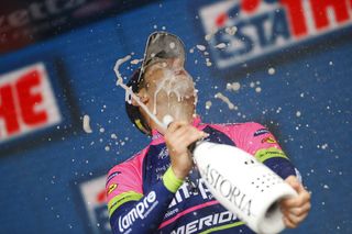 Sacha Modolo (Lampre-Merida) celebrates on the podium after winning the 13th stage of the 2015 Giro d'Italia.
