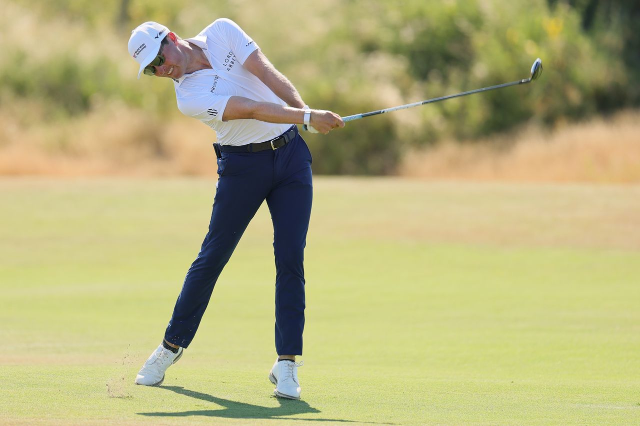 Ben Griffin hits a fairway wood off the fairway
