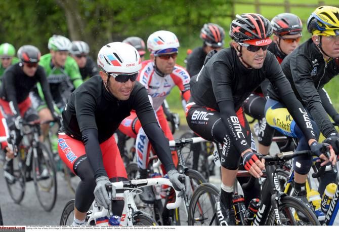 Joaquim Rodriguez (Katusha) and Sammy Sanchez (BMC) all rugged up