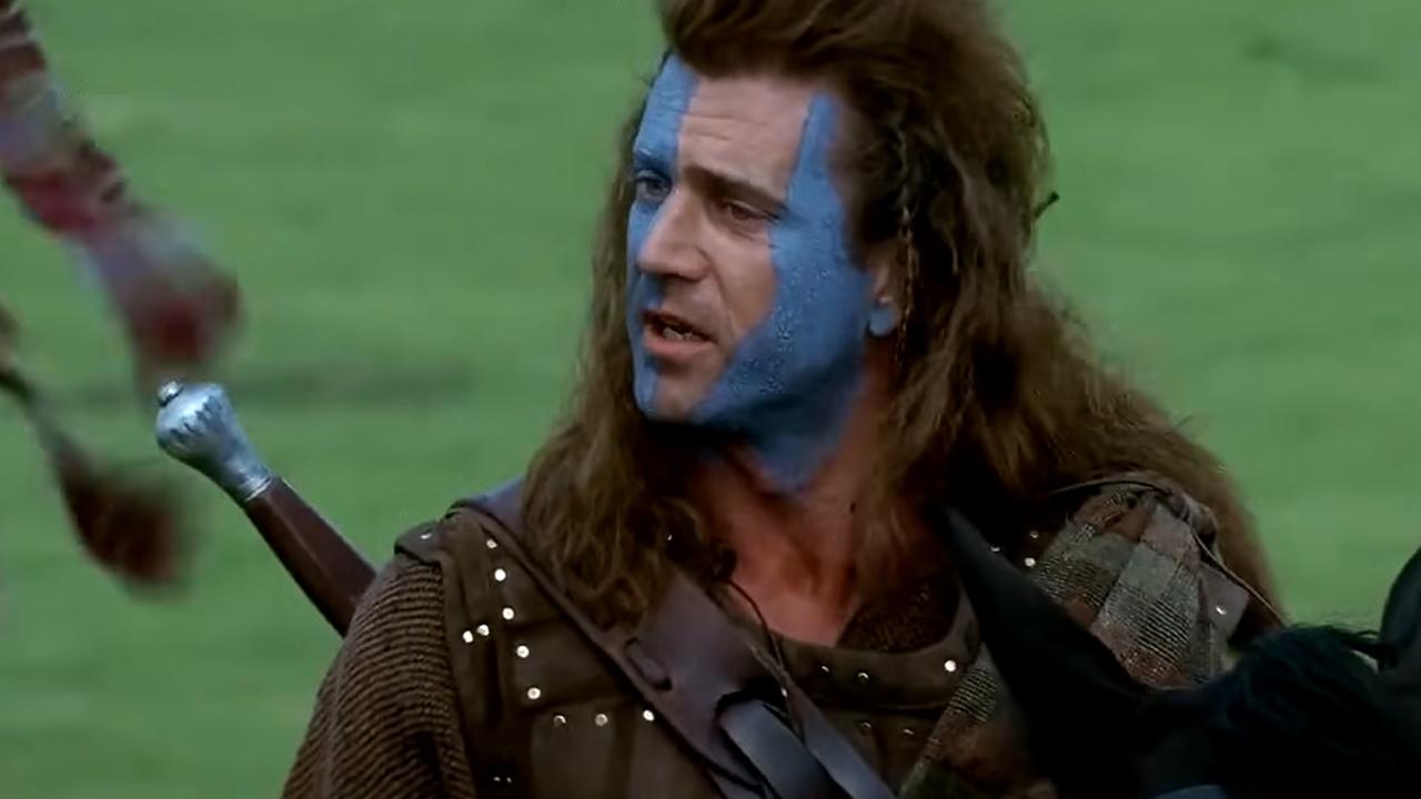 Mel Gibson as William Wallace in facepaint paint making his famous speech in Braveheard