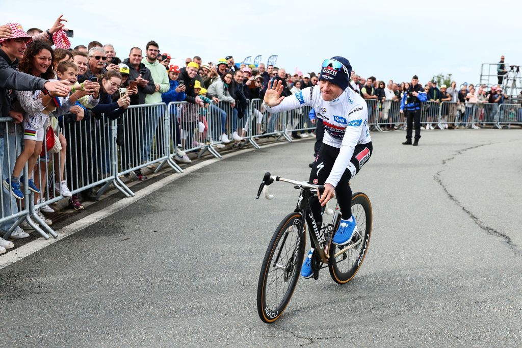 Belgian Remco Evenepoel of Soudal Quick-Step greets the fans after stage 8 of the 2024 Tour de France 