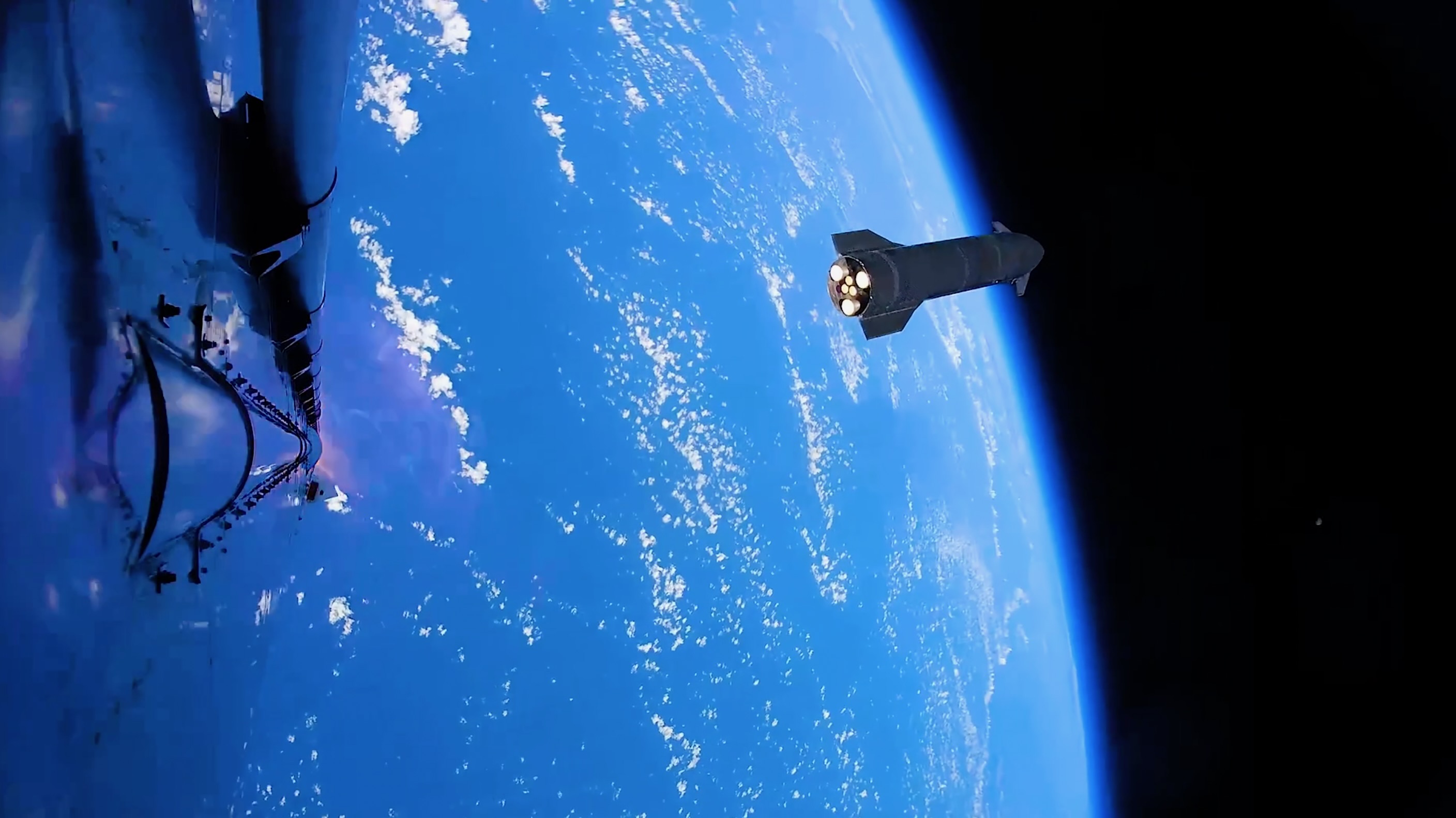 The two stages of SpaceX's Starship megarocket separate during the vehicle's 13th test flight, on July 24, 2026.