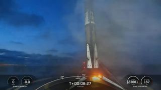A SpaceX Falcon 9 rocket first stage booster lands on the company's drone ship A Shortfall Of Gravitas in the Atlantic Ocean after a successful 12th flight to launch 53 Starlink satellites into orbit from Florida on May 6, 2022.