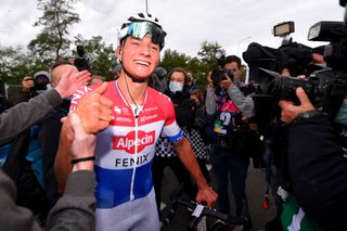 OUDENAARDE BELGIUM OCTOBER 18 Arrival Mathieu Van Der Poel of The Netherlands and Team AlpecinFenix Celebration Press Media during the 104th Tour of Flanders 2020 Ronde van Vlaanderen Men Elite a 2433km race from Antwerpen to Oudenaarde RVV20 FlandersClassic on October 18 2020 in Oudenaarde Belgium Photo by Luc ClaessenGetty Images