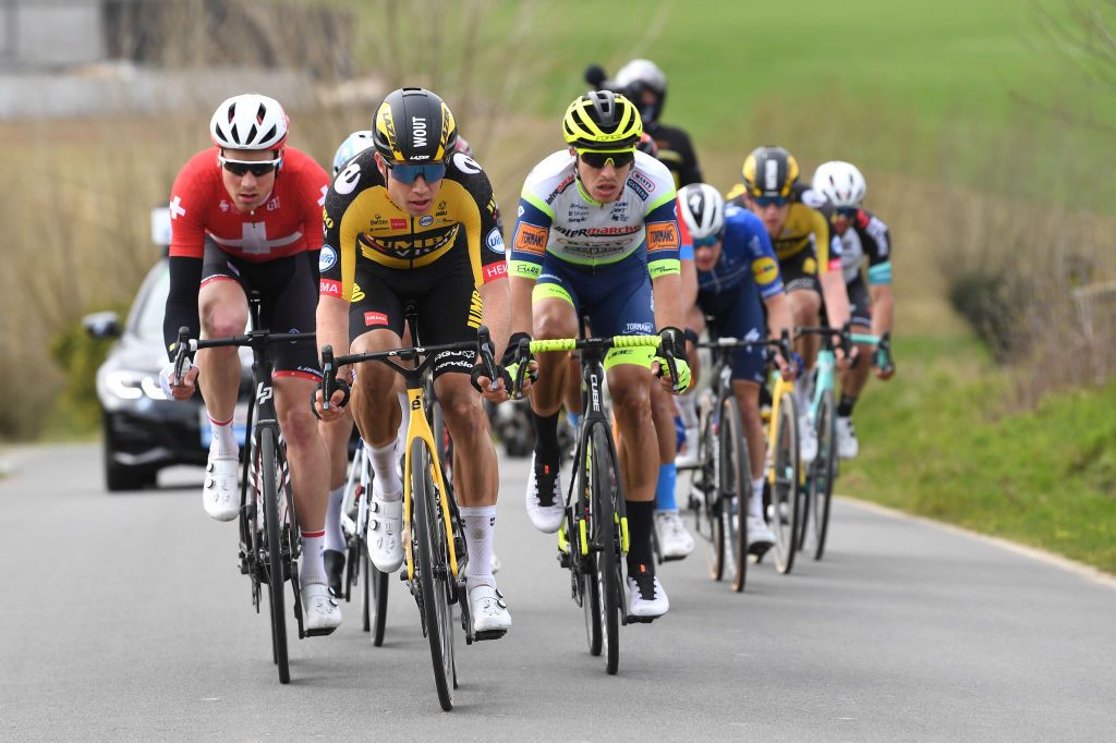 WEVELGEM BELGIUM MARCH 28 Stefan Kung of Switzerland and Team Groupama FDJ Wout Van Aert of Belgium and Team Jumbo Visma Danny Van Poppel of Netherlands and Team Intermarch Wanty Gobert Matriaux during the 83rd GentWevelgem in Flanders Fields 2021 Mens Elite a 254km race from Ypres to Wevelgem GWE21 GWEmen FlandersClassic on March 28 2021 in Wevelgem Belgium Photo by Tim de WaeleGetty Images