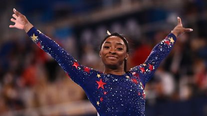 topshot usas simone biles reacts after competing in the artistic gymnastics balance beam event of the womens qualification during the tokyo 2020 olympic games at the ariake gymnastics centre in tokyo on july 25, 2021 photo by loic venance afp photo by loic venanceafp via getty images