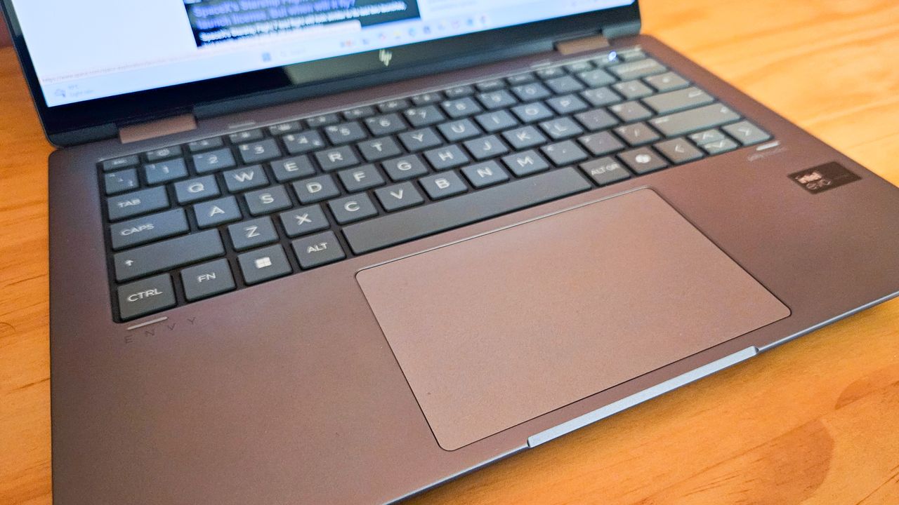 HP Envy x360 14 laptop on table (keyboard).