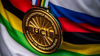 Close up on the UCI downhill winners medal
