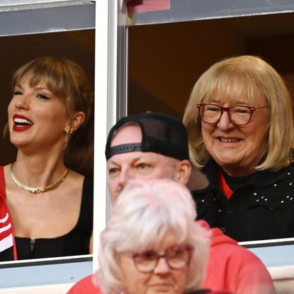 Taylor Swift and Donna Kelce smiling while watching a Kansas City Chiefs and Denver Broncos game in Kansas City on October 12, 2023