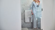 Best bathroom scales: Pictured here, a women weighging herself on bathroom scales