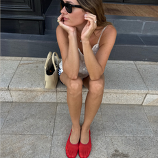 Anne-Laure Mais wears mesh flats.