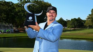 Chris Gotterup with the Myrtle Beach Classic trophy