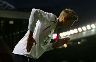 Peter Crouch of England celbrates after scoring his team's third goal during the International Friendly match between England and Hungary at Old Trafford on May 30, 2006 in Manchester, England.