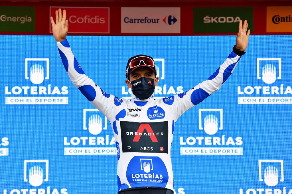LEKUNBERRI SPAIN OCTOBER 21 Podium Richard Carapaz of Ecuador and Team INEOS Grenadiers Polka Dot Mountain Jersey Celebration Mask Covid safety measures during the 75th Tour of Spain 2020 Stage 2 a 1516km stage from Pamplona to Lekunberri lavuelta LaVuelta20 La Vuelta on October 21 2020 in Lekunberri Spain Photo by Justin SetterfieldGetty Images