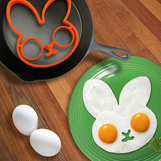 fried egg using silicone bunny mold on green plate