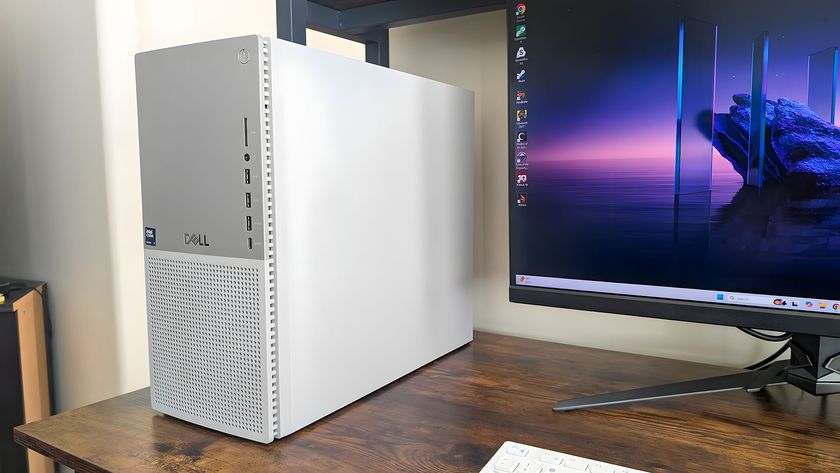 Dell Tower Plus EBT2250 on a desk and connected to a monitor. 