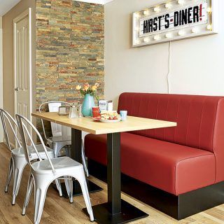 retro kitchen with banquette seating and light fixture