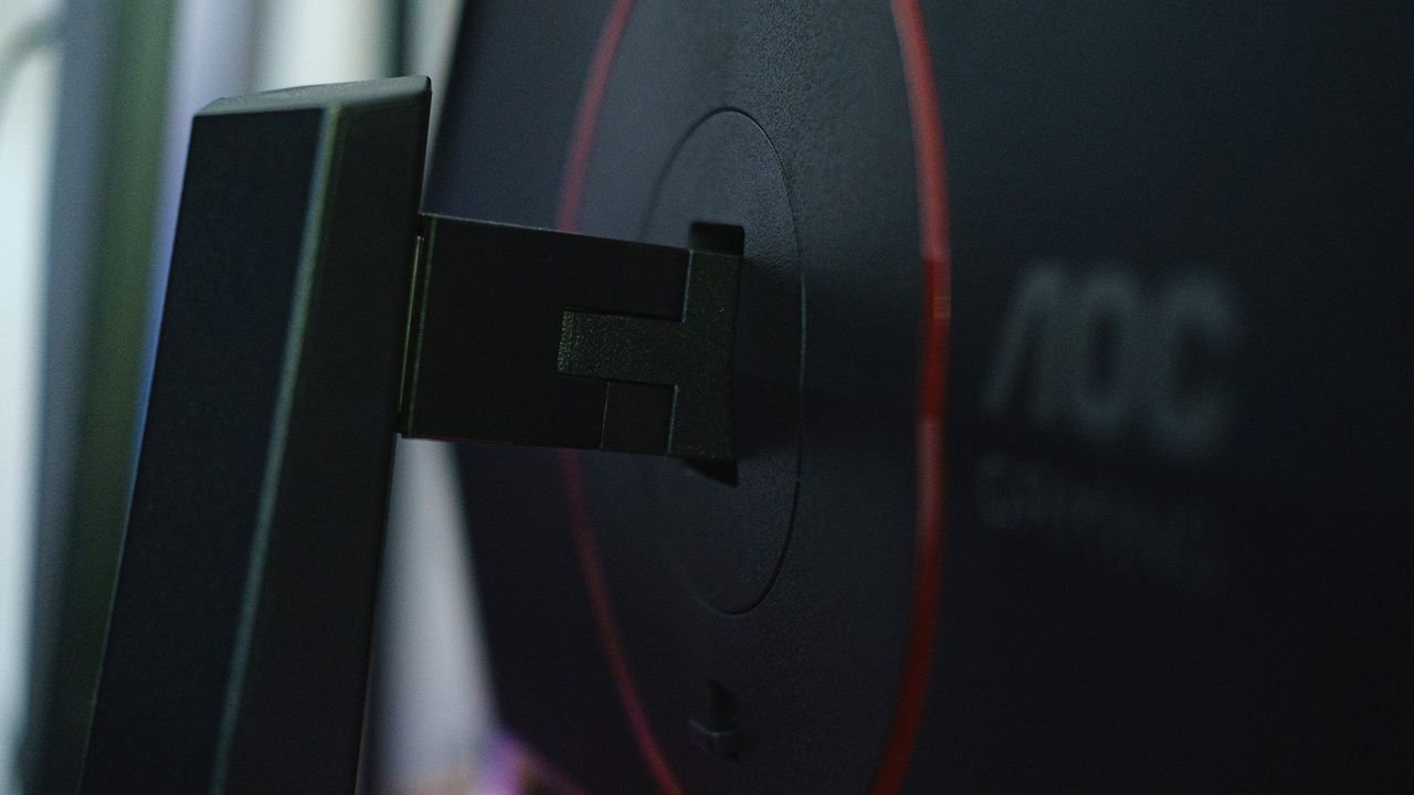 AOC GAMING Q27G4ZD monitor pedestal stand connected to back of monitor.