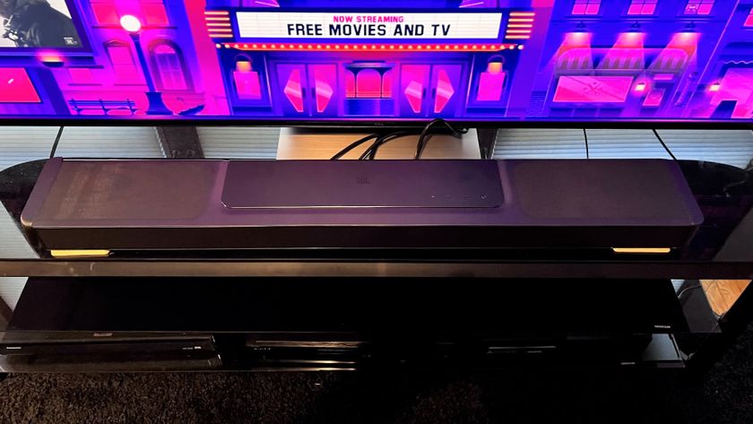 JBL Bar 1300X soundbar on TV stand