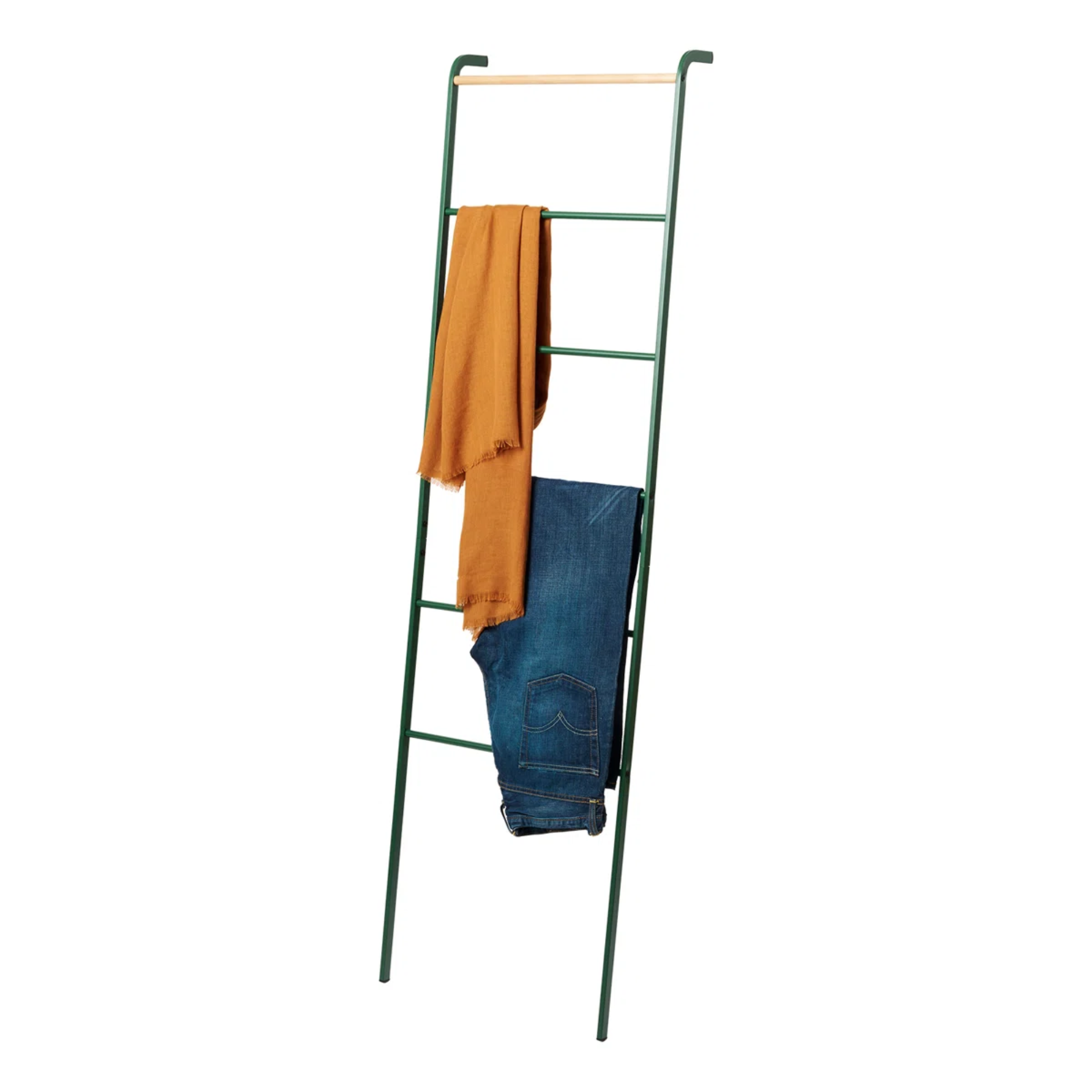 a green metal blanket ladder holding an orange scarf and a pair of jeans