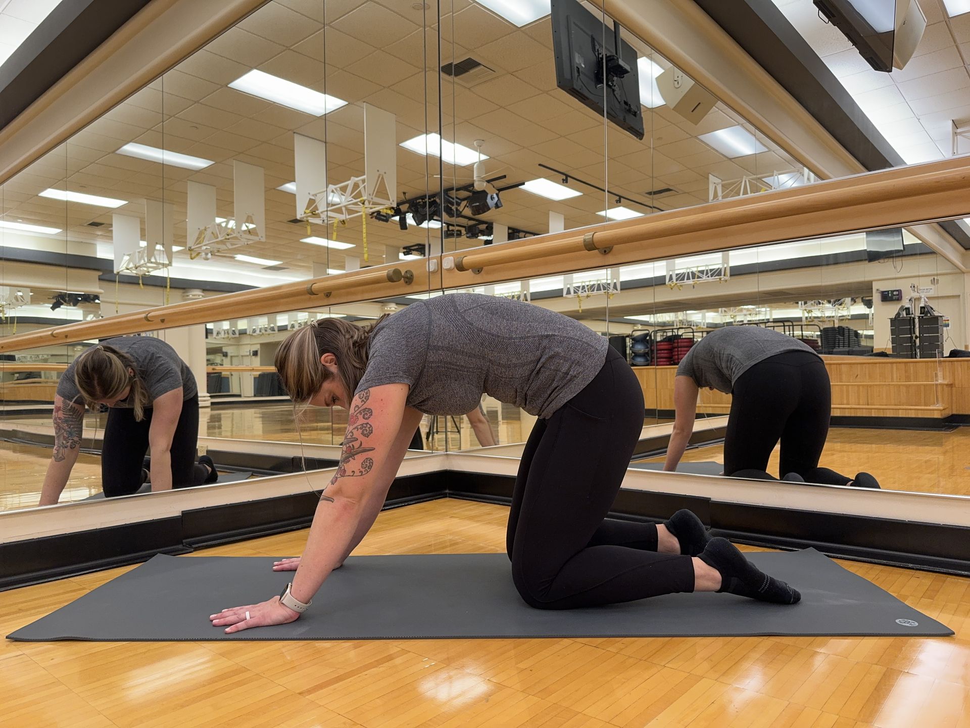 Balanced Body's Staci Alden demonstrating a cat stretch