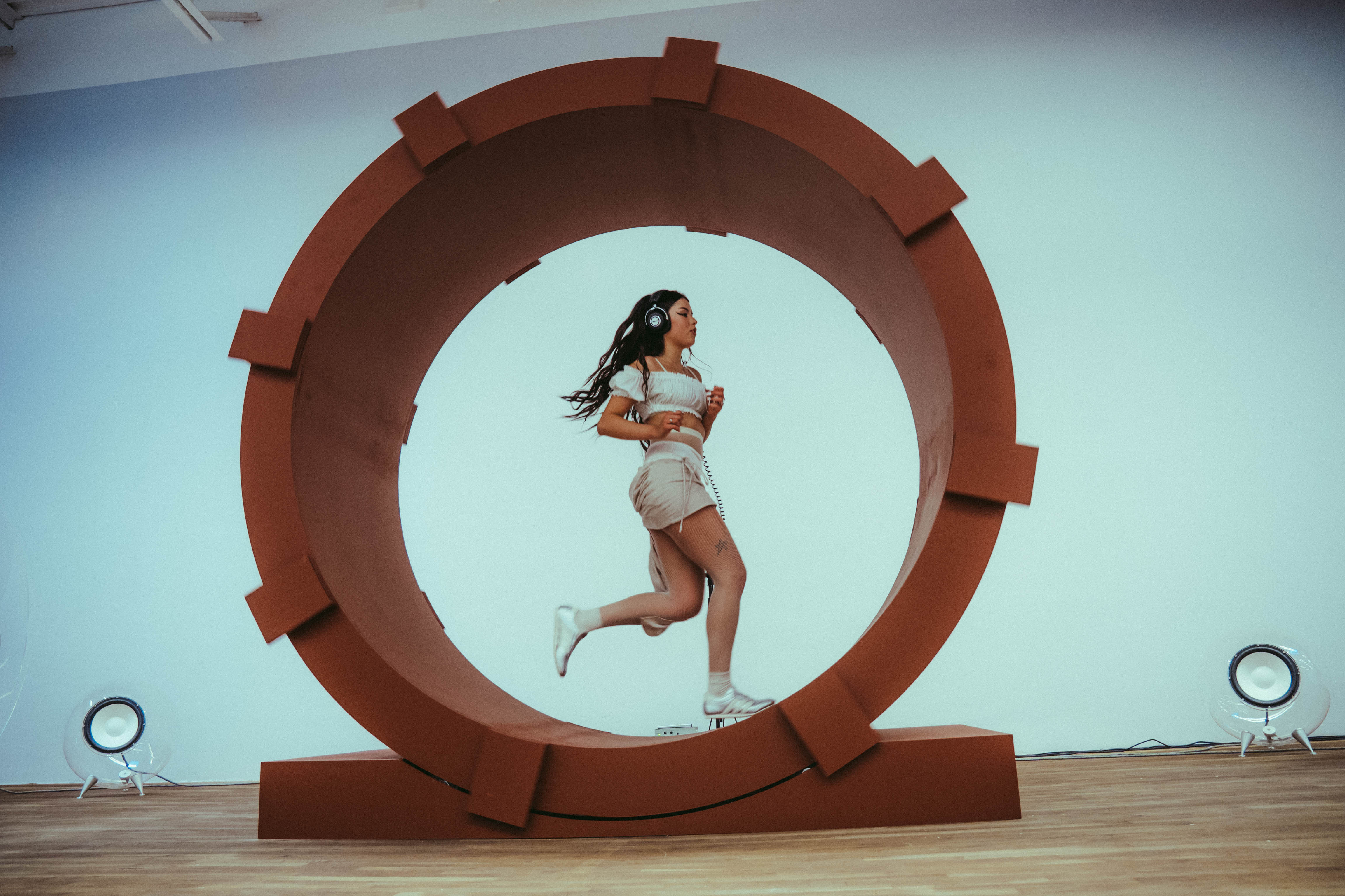 Lexa Gates on hamster wheel