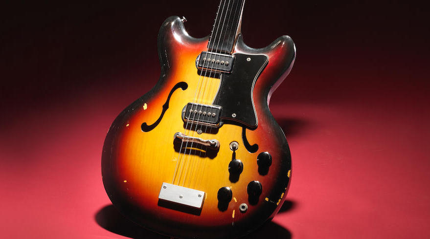 george harrison guitar sold for 570000