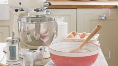 a cream country kitchen with a cream kitchenaid stand mixer and baking accessories to show bake Off buys