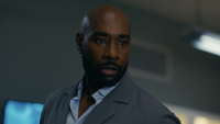 John looking at his patient in Watson Season 2x06