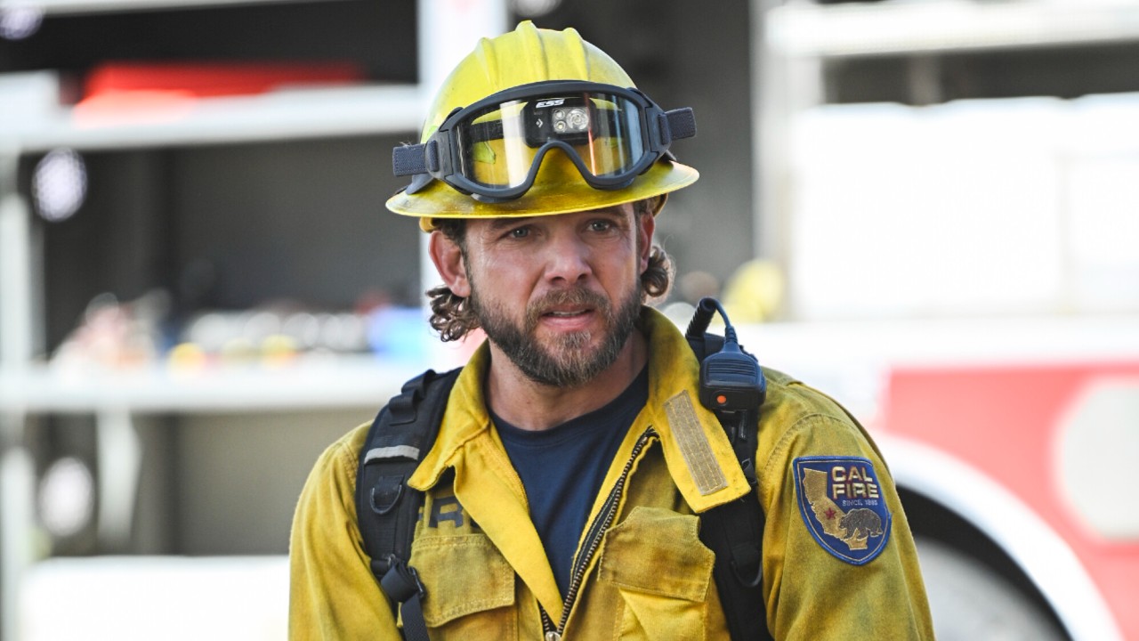 Max Thieriot as Bode in fire gear in Season 4 of Fire Country.