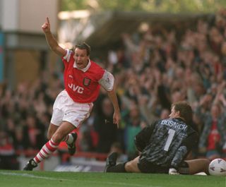 Paul Merson celebrates a goal for Arsenal against Aston Villa in October 1995.